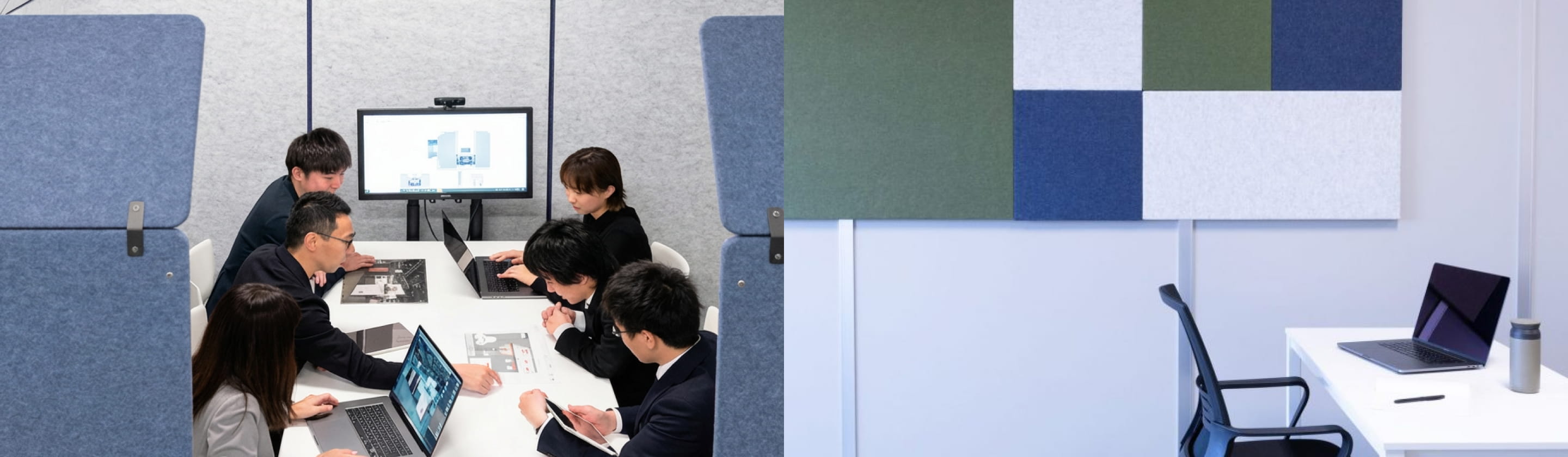 会議室でモニターを見ながら打ち合わせをするスタッフ